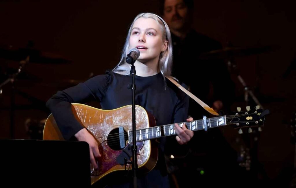 Phoebe Bridgers passionately performing on stage at Islington Assembly Hall in London