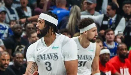  Dallas Mavericks players strategizing on the court without Anthony Davis, highlighting the impact on their offensive and defensive gameplay.