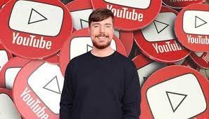 MrBeast standing in front of a massive film set with cameras and crew members.