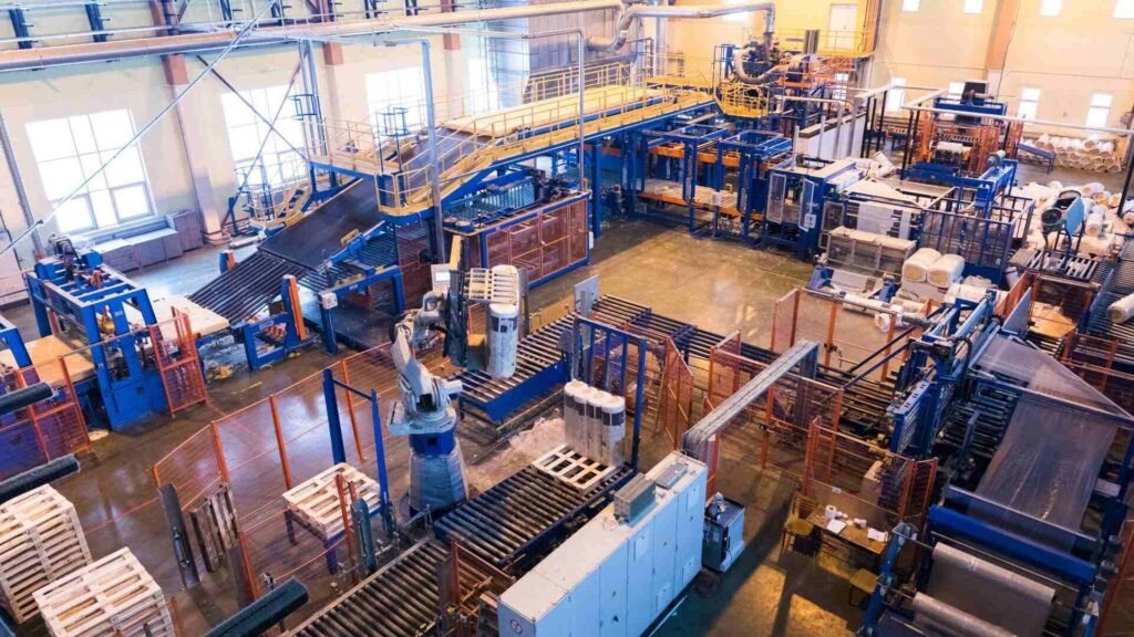 Modern Canadian factory with workers engaged in innovative manufacturing and technology.