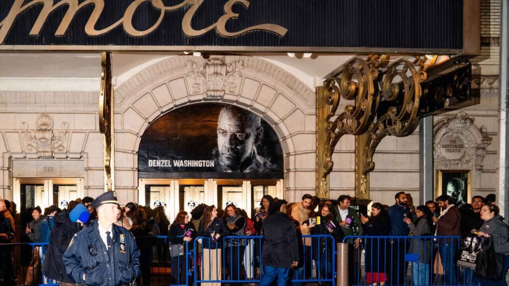 Broadway Theatre entrance with the Othello Broadway 2025 marquee and an excited crowd.