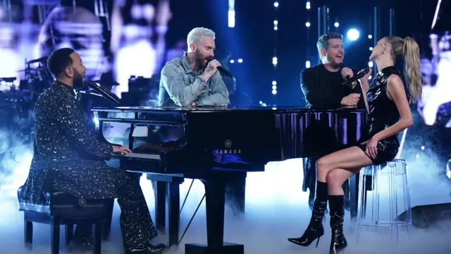 The Voice Season 27 judges performing live on stage, engaging the audience with their energy and vocals.