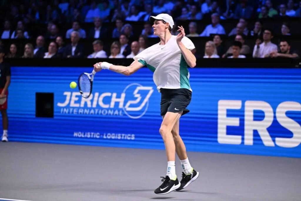 Jannik Sinner hitting a forehand in his comeback match.