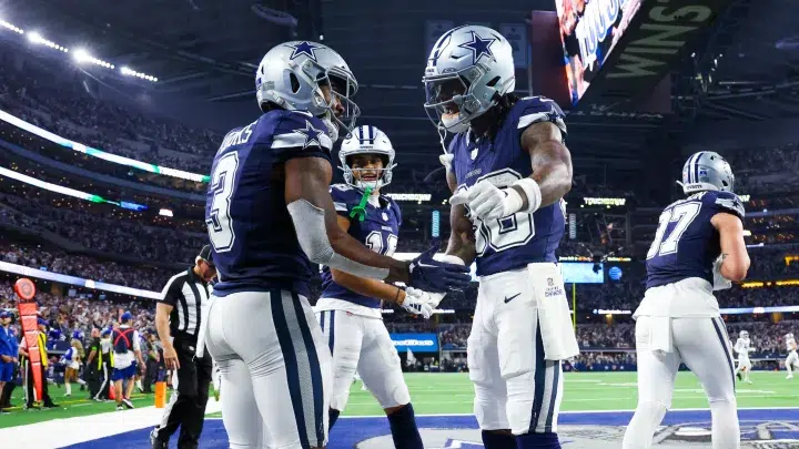 CeeDee Lamb and Brandin Cooks on the field during Cowboys game