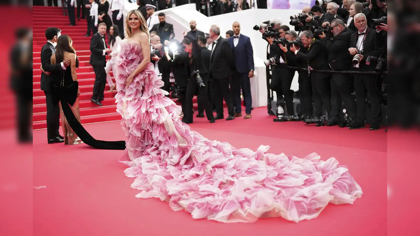 Heidi Klum in a sparkling purple gown on the Cannes 2025 red carpet.
