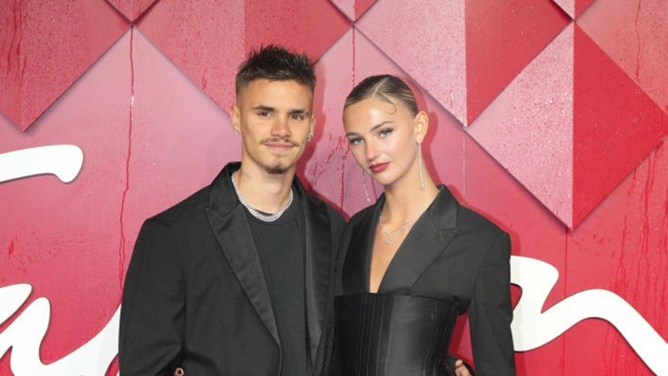 Romeo Beckham with girlfriend Mia Regan, possibly during a casual outing.