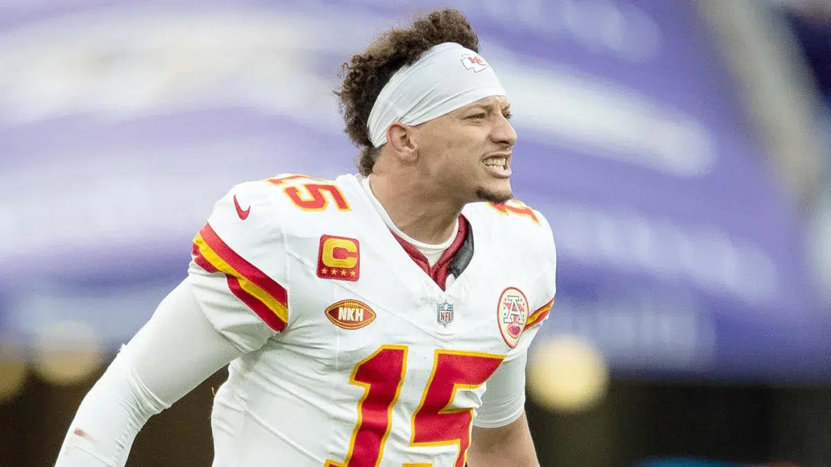 Patrick Mahomes prepares to throw during a 2025 playoff game.