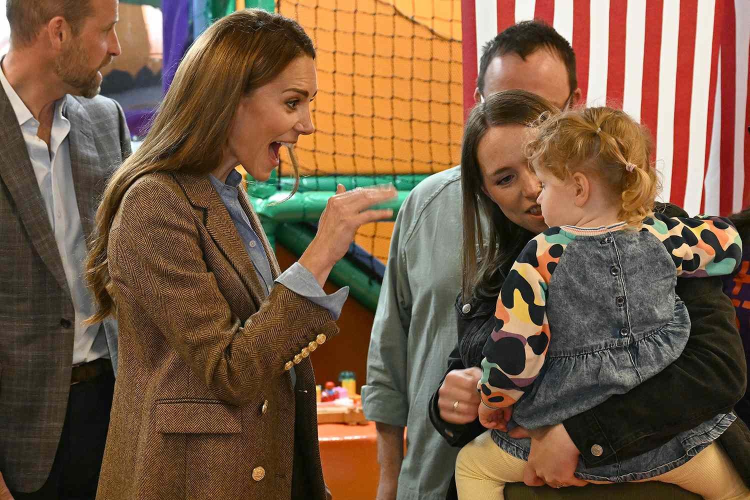 Kate Middleton holding a chainsaw gifted by Prince William