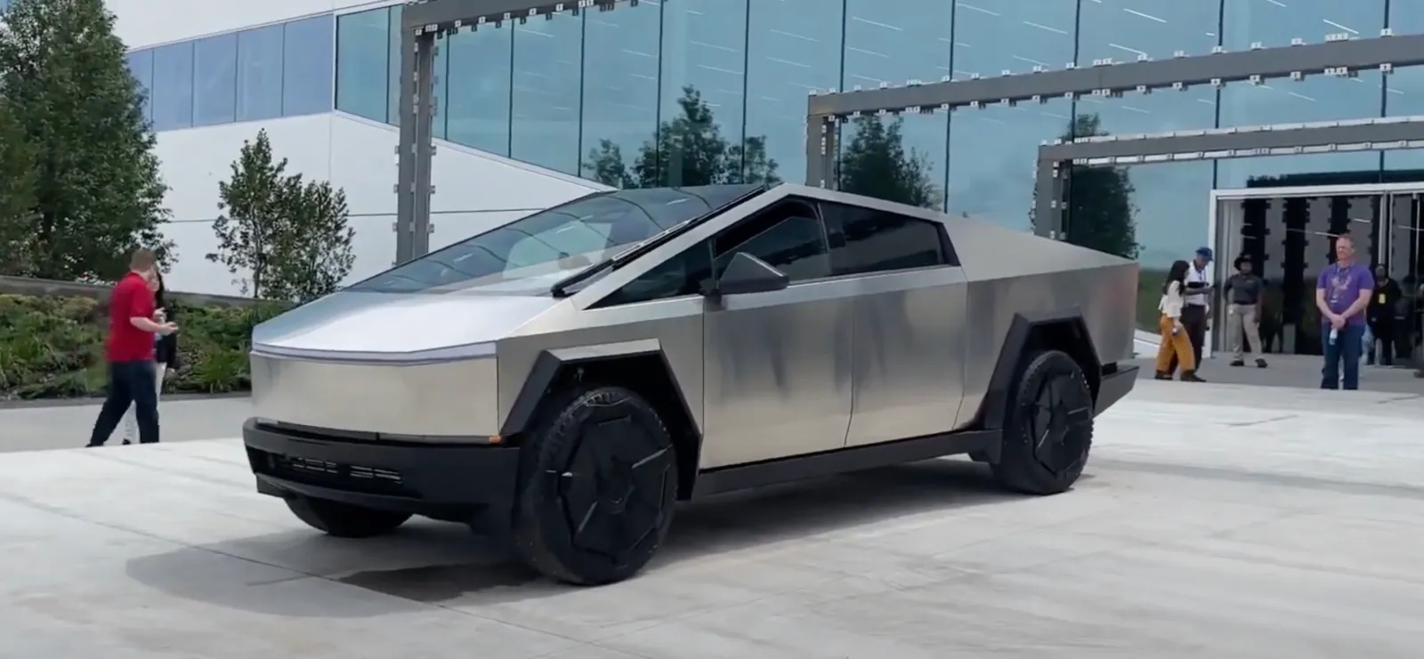 "Tesla Cybertruck electric pickup truck with stainless steel exterior"